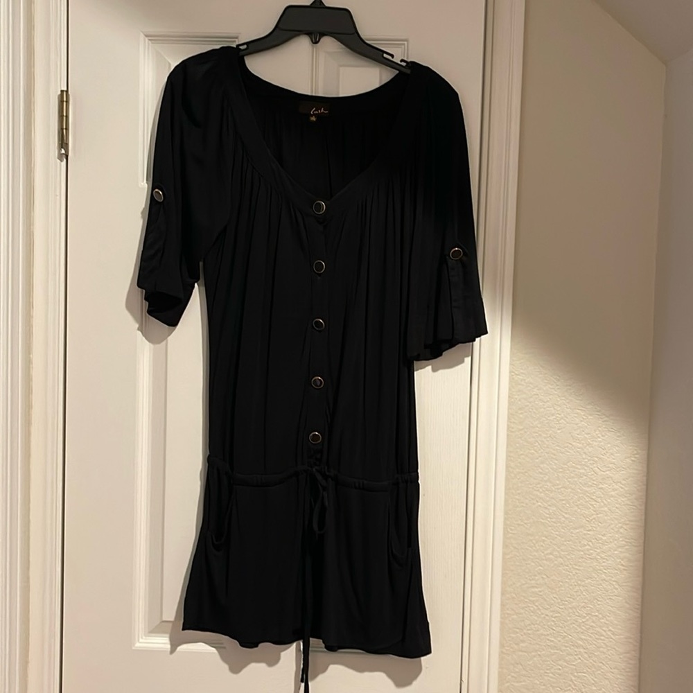 Black lush peplum style top with gold buttons
